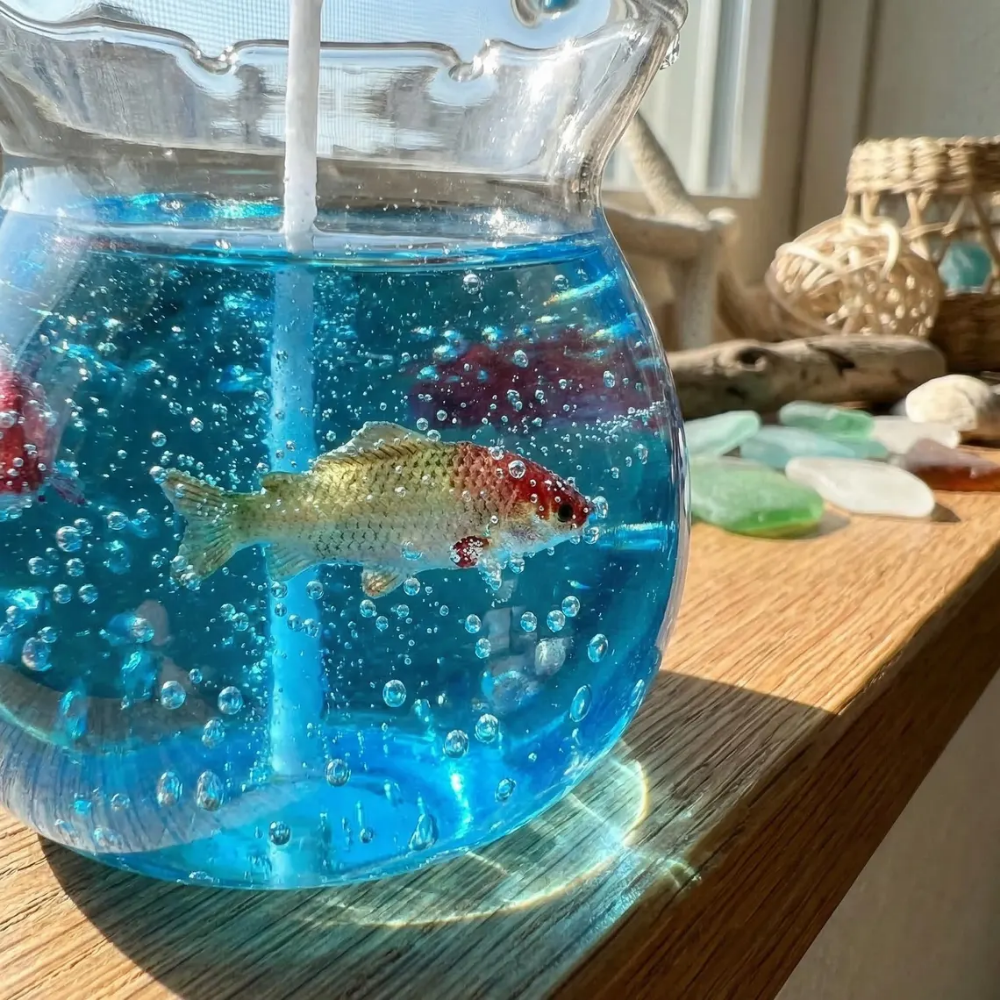The Petal Tide Aquarium | Ocean Jelly Glass Candle with Resin Fish & Wave Rim
