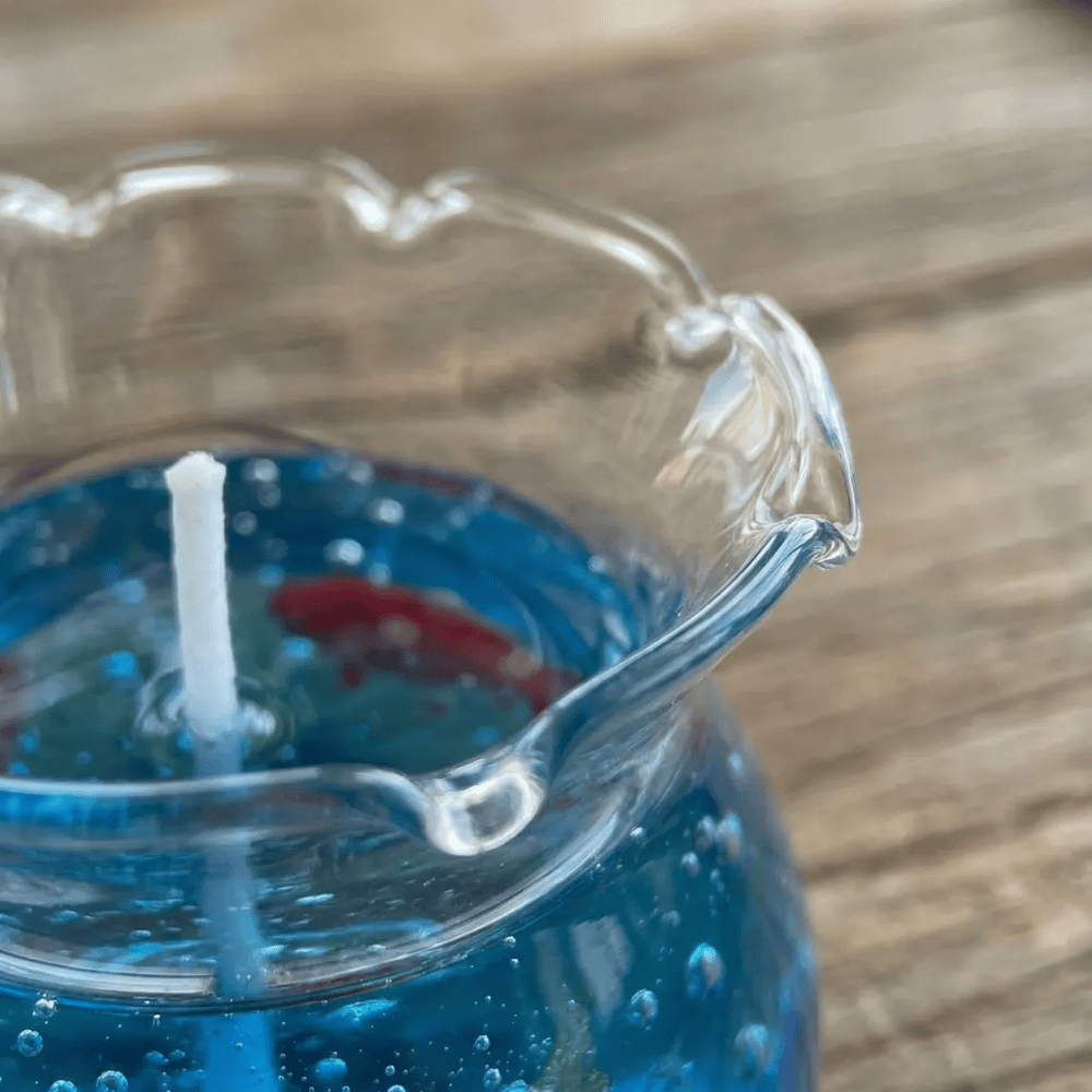 The Petal Tide Aquarium | Ocean Jelly Glass Candle with Resin Fish & Wave Rim